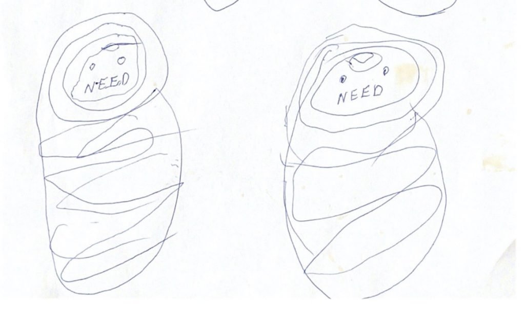 Hand drawing of NEED a baby in a blanket their face is two circles and the mouth says NEED