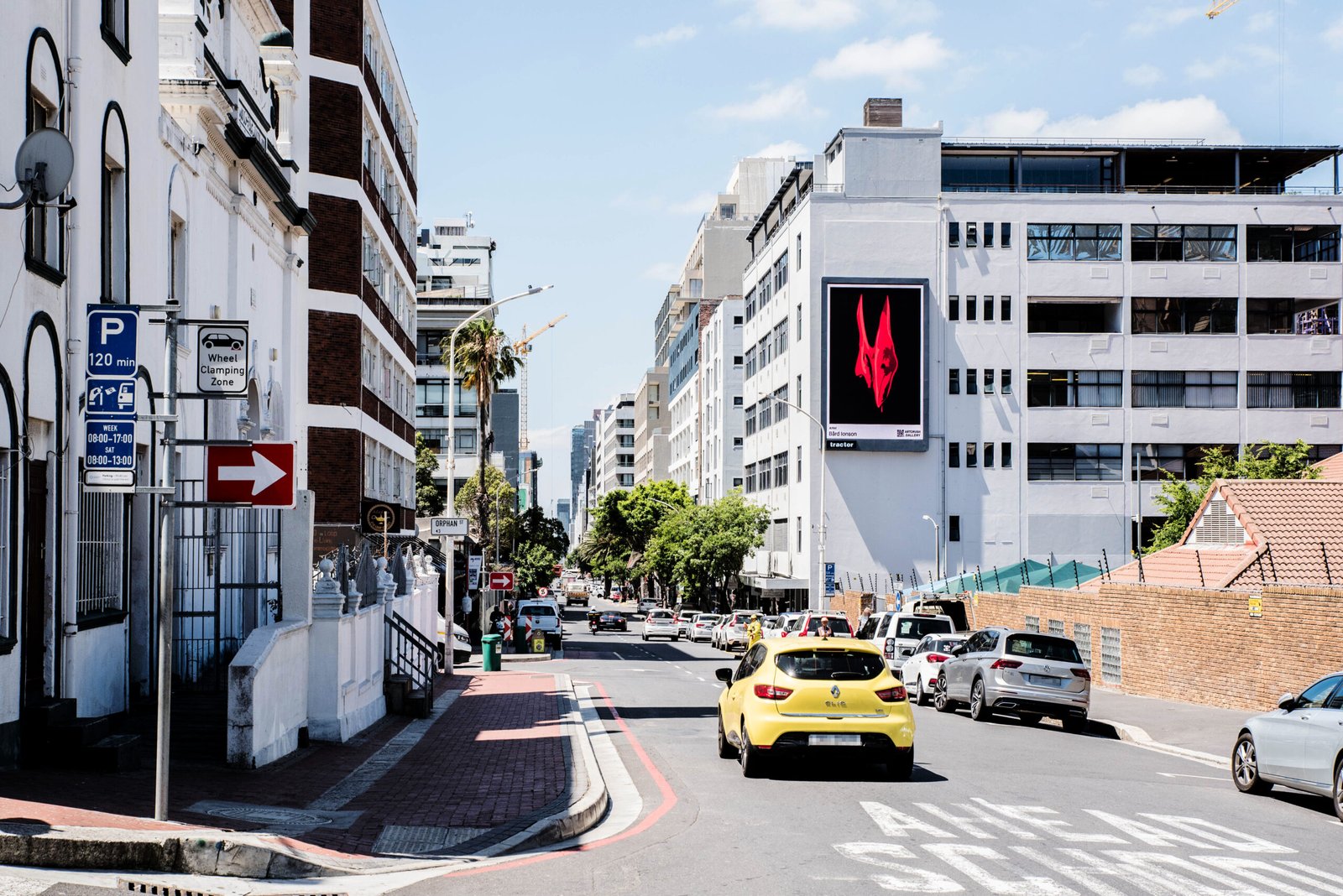 red animal horned skull on building sign in Capetown